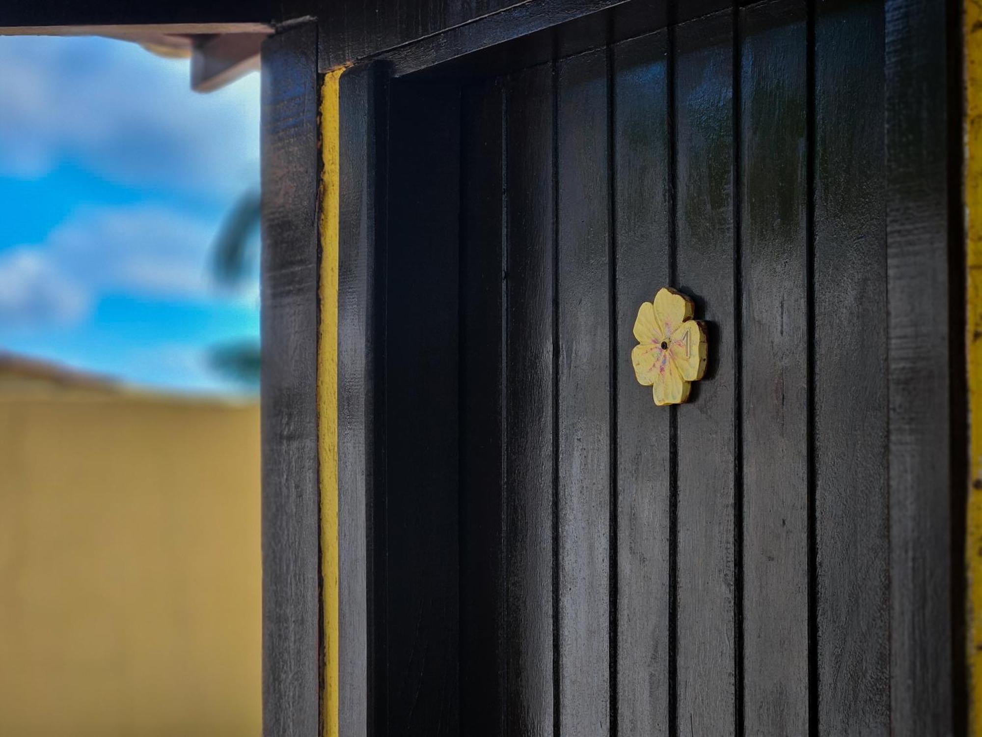 Hotel Bella Vista Ocean View Búzios Zewnętrze zdjęcie A golden flower-shaped knob on a door