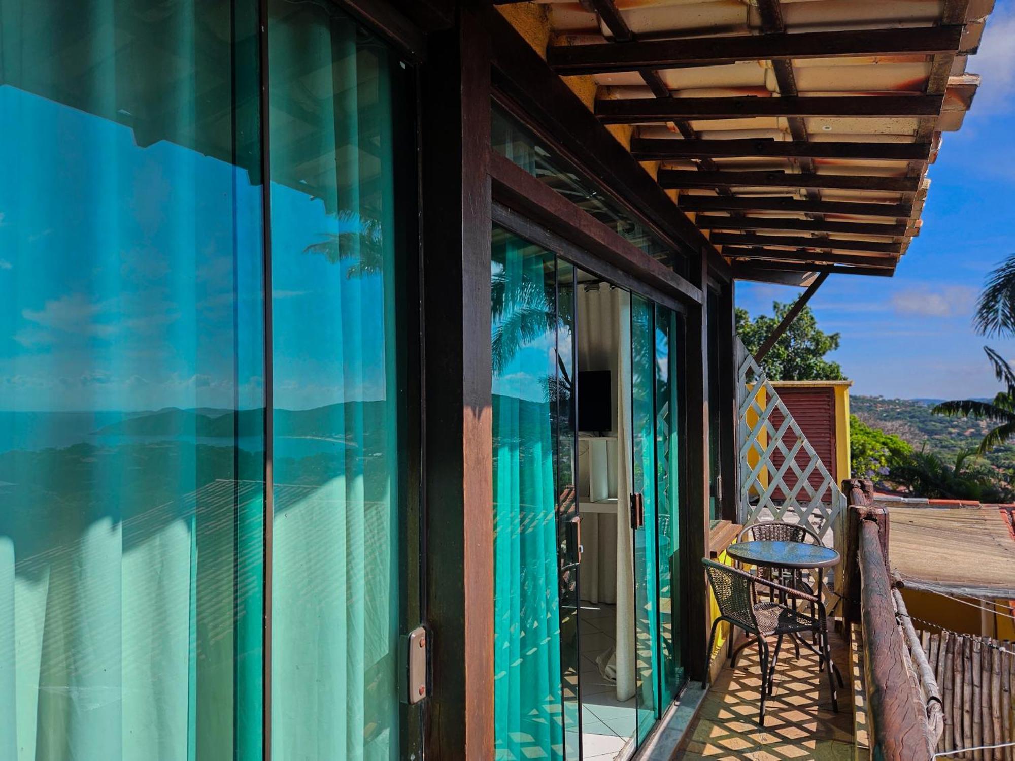 Hotel Bella Vista Ocean View Búzios Zewnętrze zdjęcie A glass house in the Philippines