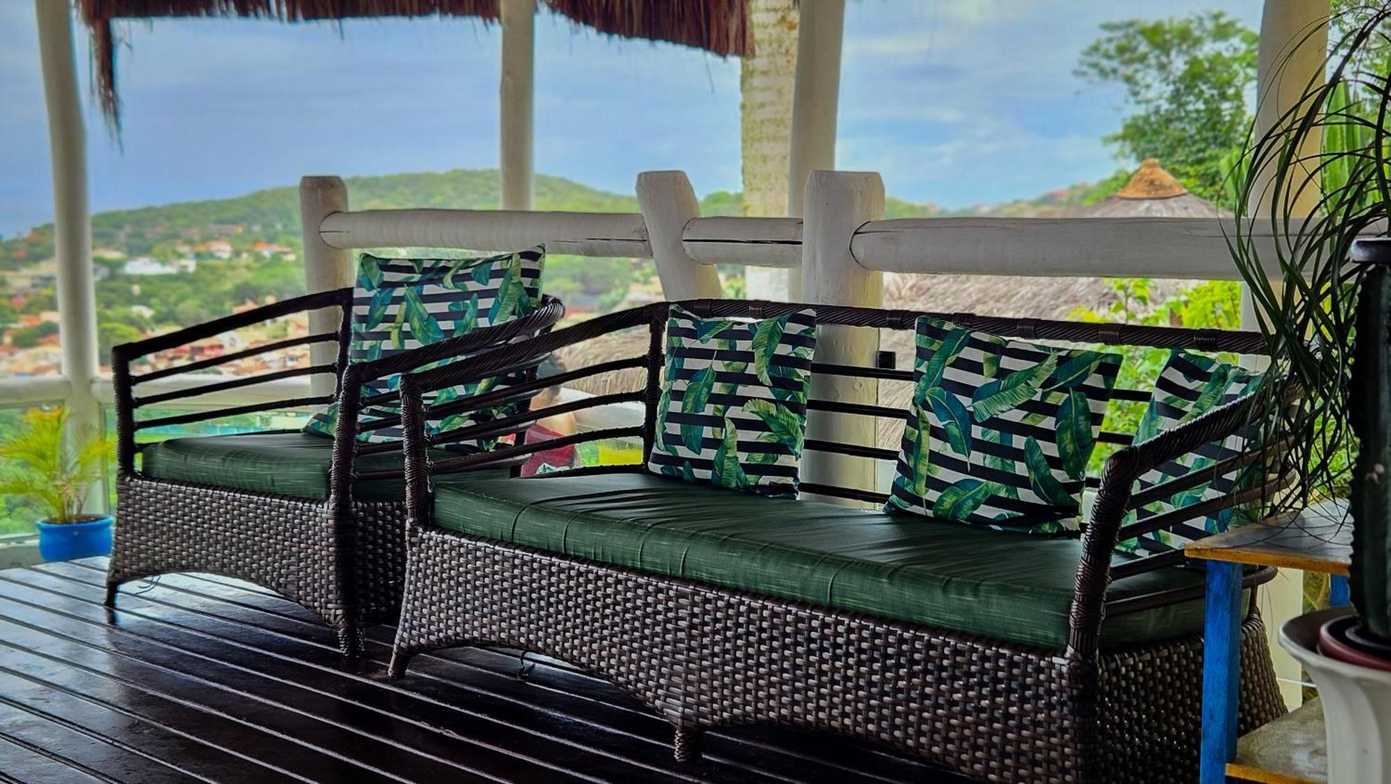 Hotel Bella Vista Ocean View Búzios Zewnętrze zdjęcie A rattan sofa